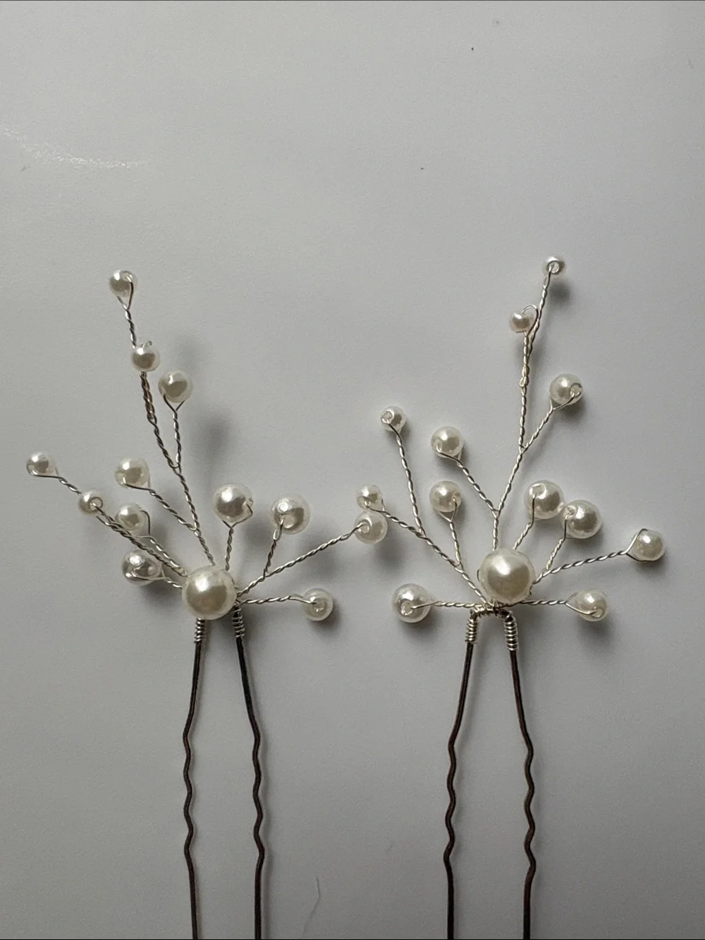Pearl and silver decorative hair pins